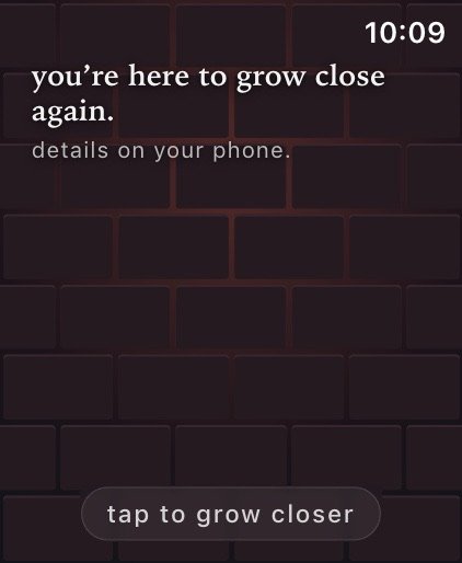 A brick wall with the words “you're here to grow close again” and a tap to grow closer button.